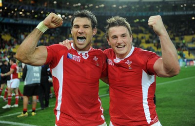 08.10.11 - Ireland v Wales - Rugby World Cup Quarter-Final 2011 - Mike Phillips and Jonathan Davies of Wales celebrate at the end of the game. 