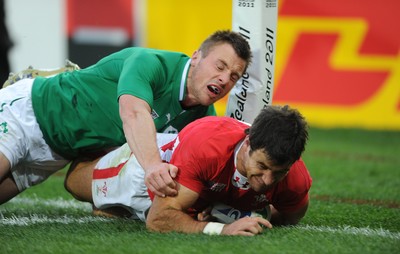 08.10.11 - Ireland v Wales - Rugby World Cup Quarter-Final 2011 - Mike Phillips of Wales beats Tommy Bowe of Ireland and dives in to score try. 