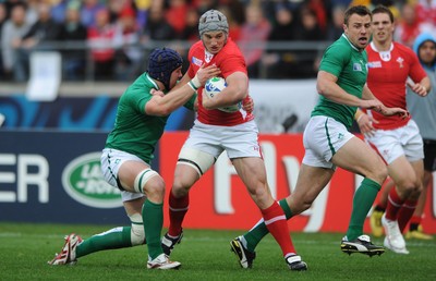 08.10.11 - Ireland v Wales - Rugby World Cup Quarter-Final 2011 - Jonathan Davies of Wales is tackled by Sean O'Brien of Ireland. 