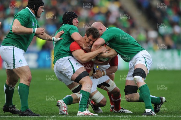 08.10.11 - Ireland v Wales - Rugby World Cup Quarter-Final 2011 - Sam Warburton of Wales is tackled by Stephen Ferris and Paul O'Connell of Ireland 