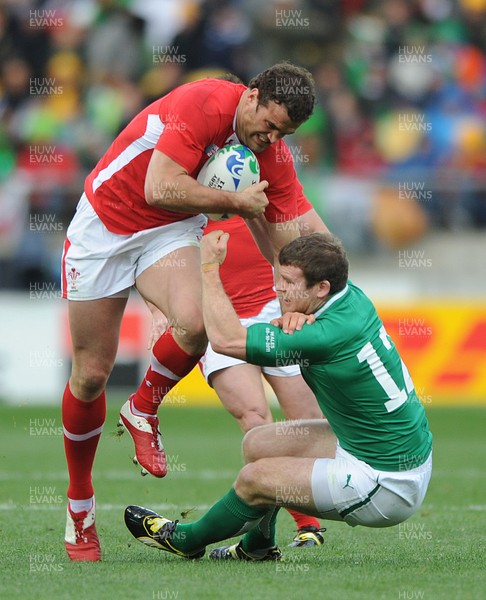 08.10.11 - Ireland v Wales - Rugby World Cup Quarter-Final 2011 - Jamie Roberts of Wales is tackled by Gordon D'Arcy of Ireland. 