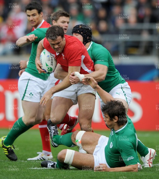 08.10.11 - Ireland v Wales - Rugby World Cup Quarter-Final 2011 - Jamie Roberts of Wales is tackled by Stephen Ferris of Ireland. 