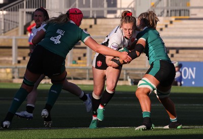 090526 - Ireland v Wales, 2026 Guinness Women’s 6 Nations - Hannah Dallavalle of Wales is held