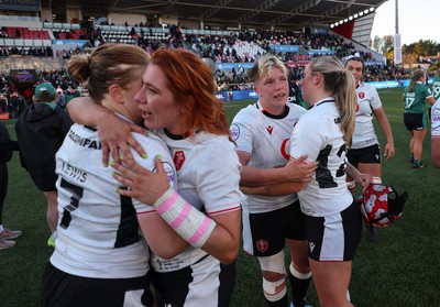 090526 - Ireland v Wales, 2026 Guinness Women’s 6 Nations - Bethan Lewis of Wales, Georgia Evans of Wales, Donna Rose of Wales and Freya Bell of Wales embrace at the end of the match 