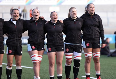 090526 - Ireland v Wales, 2026 Guinness Women’s 6 Nations - Left to right, Jasmine Joyce of Wales, Alisha Joyce of Wales, Kayleigh Powell of Wales, Bethan Lewis of Wales and Natalia John of Wales during the national anthems