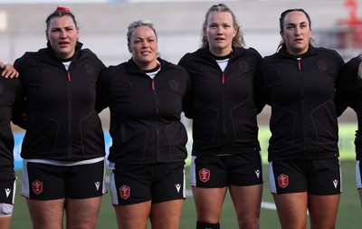090526 - Ireland v Wales, 2026 Guinness Women’s 6 Nations - Left to right, Gwenllian Pyrs of Wales, Kelsey Jones of Wales, Carys Cox of Wales and Courtney Keight of Wales line up for the anthems ahead of the match