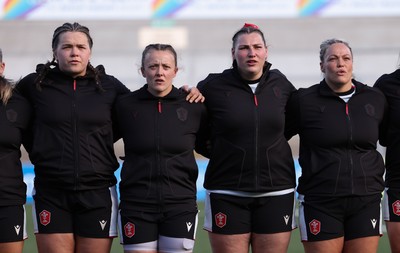 090526 - Ireland v Wales, 2026 Guinness Women’s 6 Nations - Left to right, Maisie Davies of Wales, Lleucu George of Wales, Gwenllian Pyrs of Wales and Kelsey Jones of Wales line up for the anthems ahead of the match