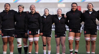 090526 - Ireland v Wales, 2026 Guinness Women’s 6 Nations - Left to right, Sisilia Tuipulotu of Wales, Donna Rose of Wales, Georgia Evans of Wales, Keira Bevan of Wales, Seren Lockwood of Wales, Jorja Aiono of Wales and Branwen Metcalfe of Wales line up for the anthems ahead of the match