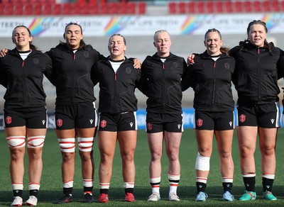 090526 - Ireland v Wales, 2026 Guinness Women’s 6 Nations - Left to right, Branwen Metcalfe of Wales, Bryonie King of Wales, Molly Reardon of Wales, Nikita Prothero of Wales, Freya Bell of Wales and Maisie Davies of Wales line up for the anthems ahead of the match