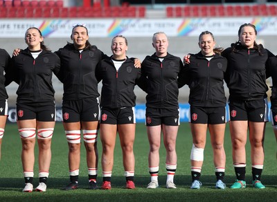 090526 - Ireland v Wales, 2026 Guinness Women’s 6 Nations - Left to right, Branwen Metcalfe of Wales, Bryonie King of Wales, Molly Reardon of Wales, Nikita Prothero of Wales, Freya Bell of Wales and Maisie Davies of Wales line up for the anthems ahead of the match