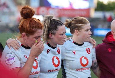 090526 - Ireland v Wales, 2026 Guinness Women’s 6 Nations - Georgia Evans of Wales, Alisha Joyce of Wales and Bethan Lewis of Wales  at the end of the match 