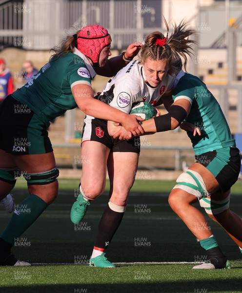 090526 - Ireland v Wales, 2026 Guinness Women’s 6 Nations - Hannah Dallavalle of Wales is held