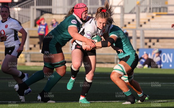 090526 - Ireland v Wales, 2026 Guinness Women’s 6 Nations - Hannah Dallavalle of Wales is held