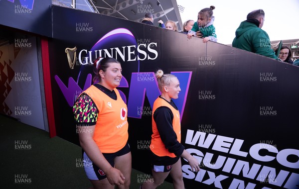 090526 - Ireland v Wales, 2026 Guinness Women’s 6 Nations - Stella Orrin of Wales and Seren Singleton of Wales make their way to the pitch
