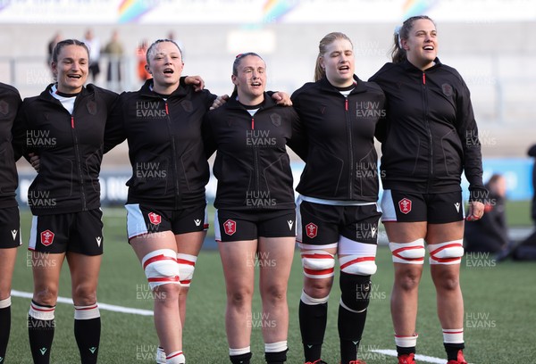 090526 - Ireland v Wales, 2026 Guinness Women’s 6 Nations - Left to right, Jasmine Joyce of Wales, Alisha Joyce of Wales, Kayleigh Powell of Wales, Bethan Lewis of Wales and Natalia John of Wales during the national anthems