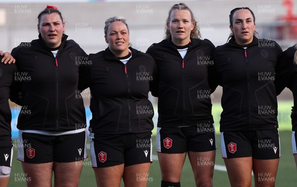 090526 - Ireland v Wales, 2026 Guinness Women’s 6 Nations - Left to right, Gwenllian Pyrs of Wales, Kelsey Jones of Wales, Carys Cox of Wales and Courtney Keight of Wales line up for the anthems ahead of the match
