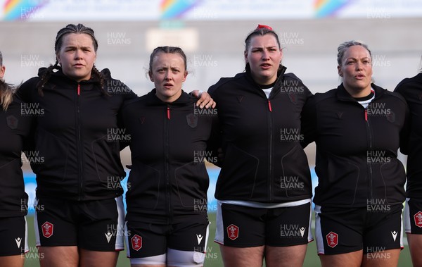 090526 - Ireland v Wales, 2026 Guinness Women’s 6 Nations - Left to right, Maisie Davies of Wales, Lleucu George of Wales, Gwenllian Pyrs of Wales and Kelsey Jones of Wales line up for the anthems ahead of the match
