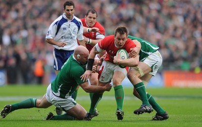 13.03.10 - Ireland v Wales - RBS Six Nations 2010 - Matthew Rees of Wales is tackled by John Hayes of Ireland and Paul O'Connell of Ireland. 
