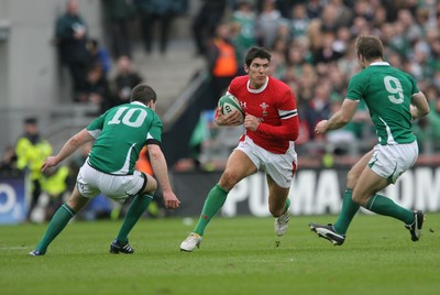 13.03.10 Ireland v Wales... Wales James Hook runs between Ireland's Tomas O'Leary and Jonathan Sexton. 
