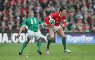13.03.10 Ireland v Wales... Wales James Hook takes on Ireland's Keith Earl. 