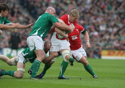13.03.10 Ireland v Wales... Wales Bradley Davies is tackled by Ireland's John Hayes. 