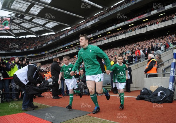 13.03.10 - Ireland v Wales - RBS Six Nations 2010 - Brian O'Driscoll of Ireland runs out to win his 100th cap. 