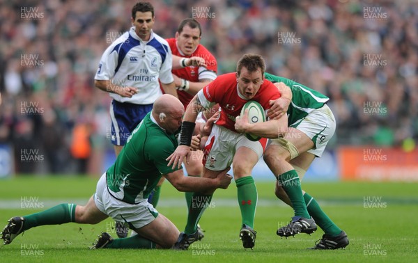 13.03.10 - Ireland v Wales - RBS Six Nations 2010 - Matthew Rees of Wales is tackled by John Hayes of Ireland and Paul O'Connell of Ireland. 