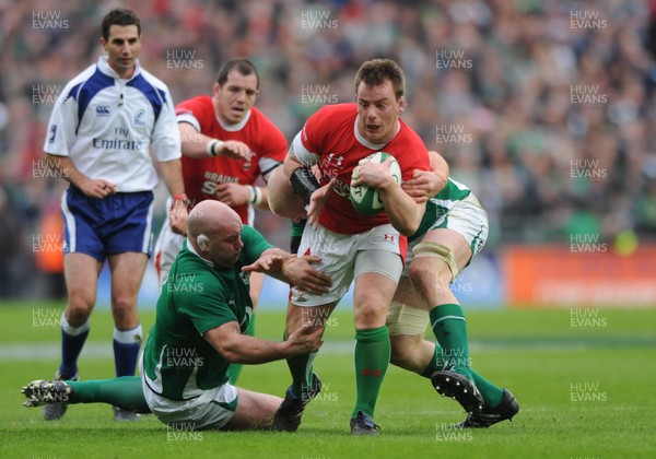13.03.10 - Ireland v Wales - RBS Six Nations 2010 - Matthew Rees of Wales is tackled by John Hayes of Ireland and Paul O'Connell of Ireland. 