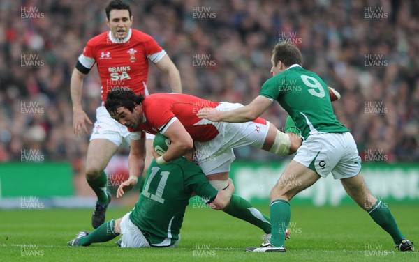 13.03.10 - Ireland v Wales - RBS Six Nations 2010 - Jonathan Thomas of Wales is tackled by Keith Earls of Ireland. 