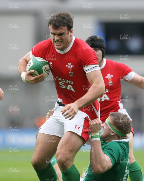 13.03.10 Ireland v Wales... Wales Jamie Roberts is tackled by Ireland's Jamie Heaslip. 