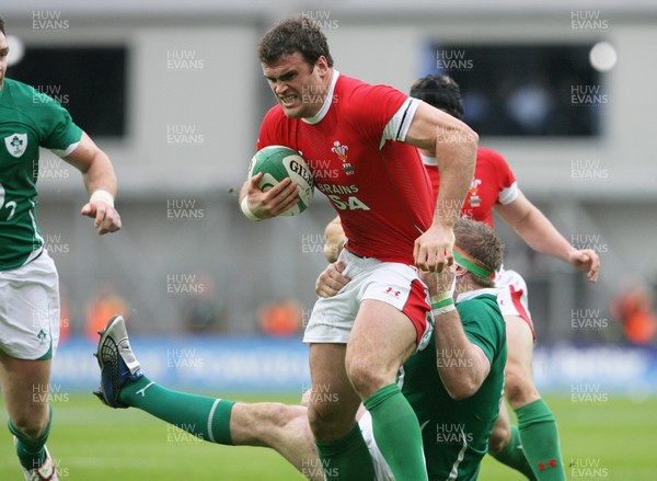 13.03.10 Ireland v Wales... Wales Jamie Roberts is tackled by Ireland's Jamie Heaslip. 