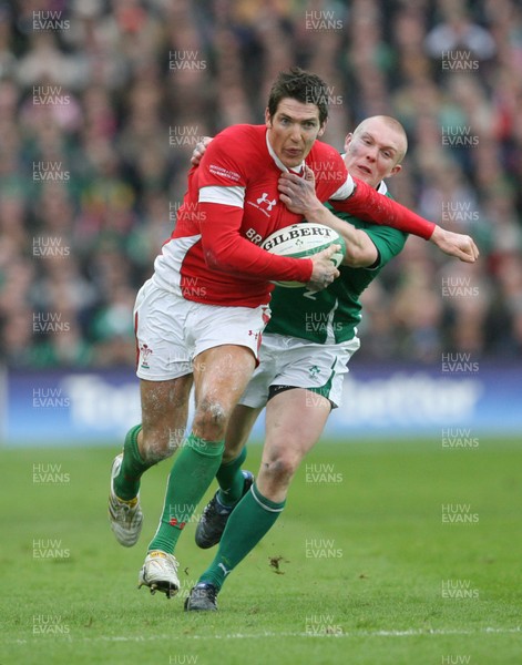 13.03.10 Ireland v Wales... Wales James Hook takes on Ireland's Keith Earl. 