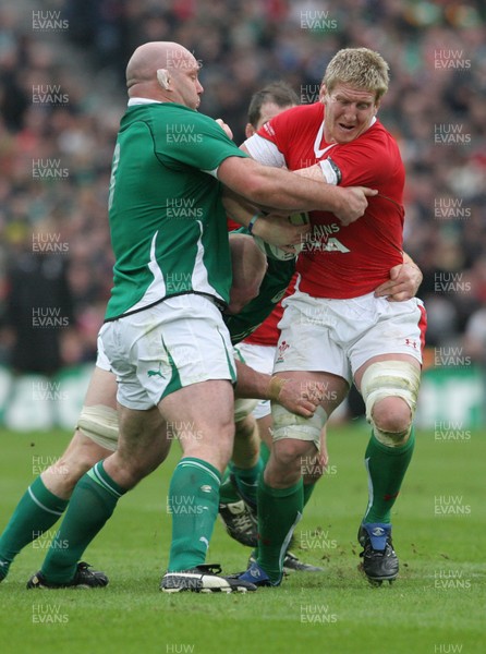 13.03.10 Ireland v Wales... Wales Bradley Davies is tackled by Ireland's John Hayes. 