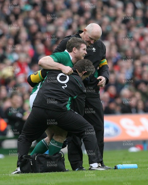 13.03.10 Ireland v Wales... Ireland's Gordon D'Arcy leaves the field injured. 