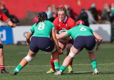 130424 - Ireland  v Wales, Guinness Women’s 6 Nations - Abbie Fleming of Wales takes on Brittany Hogan of Ireland and Aoife Wafer of Ireland’