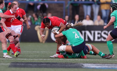 130424 - Ireland  v Wales, Guinness Women’s 6 Nations - Sisilia Tuipulotu of Wales takes on Brittany Hogan of Ireland and Dorothy Wall of Ireland