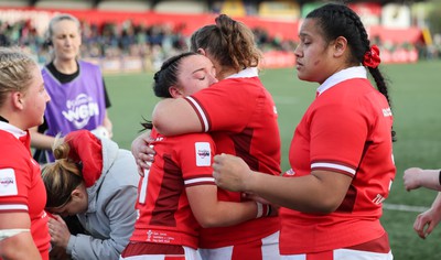 130424 - Ireland  v Wales, Guinness Women’s 6 Nations - Sian Jones of Wales and Gwenllian Pyrs of Wales embrace at the end of the match