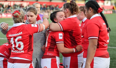 130424 - Ireland  v Wales, Guinness Women’s 6 Nations - Sian Jones of Wales and Gwenllian Pyrs of Wales embrace at the end of the match