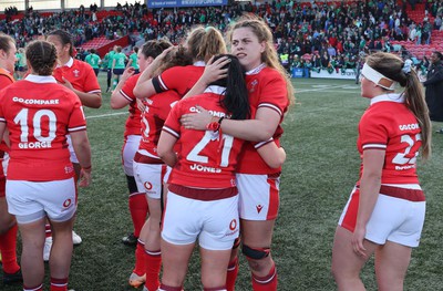 130424 - Ireland  v Wales, Guinness Women’s 6 Nations - Wales players embrace each other att the end of the match