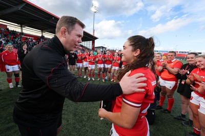 130424 - Ireland  v Wales, Guinness Women’s 6 Nations - Ioan Cunningham, Wales Women head coach, presents Gwennan Hopkins of Wales with her first cap