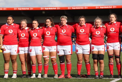 130424 - Ireland  v Wales, Guinness Women’s 6 Nations - Left to right, Sisilia Tuipulotu, Molly Reardon, Sian Jones, Gwennan Hopkins, Donna Rose, Carys Phillips and Alex Callender and Natalia John during the Welsh national anthem