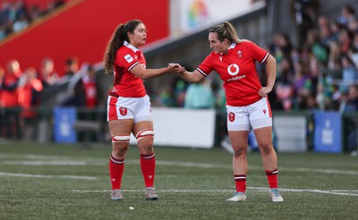 130424 - Ireland  v Wales, Guinness Women’s 6 Nations - Gwennan Hopkins of Wales, left, is congratulated by Courtney Keight of Wales after she scores try