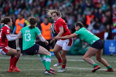 130424 - Ireland  v Wales, Guinness Women’s 6 Nations - Courtney Keight of Wales is held by the Irish defence