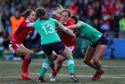 130424 - Ireland  v Wales, Guinness Women’s 6 Nations - Courtney Keight of Wales is held by the Irish defence