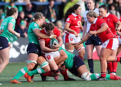 130424 - Ireland  v Wales, Guinness Women’s 6 Nations - Natalia John of Wales is held by the Irish defence