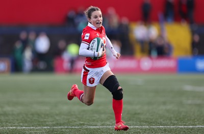 130424 - Ireland  v Wales, Guinness Women’s 6 Nations - Jasmine Joyce of Wales looks to head for the line