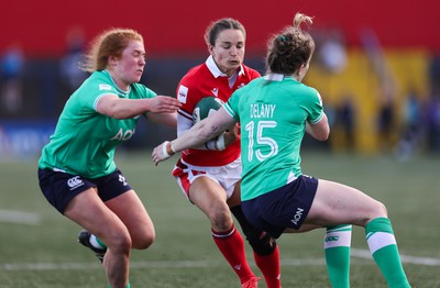 130424 - Ireland  v Wales, Guinness Women’s 6 Nations - Jasmine Joyce of Wales is held short of the line