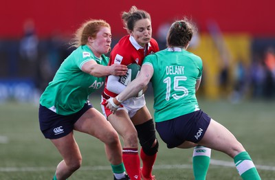 130424 - Ireland  v Wales, Guinness Women’s 6 Nations - Jasmine Joyce of Wales is held short of the line