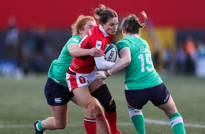 130424 - Ireland  v Wales, Guinness Women’s 6 Nations - Jasmine Joyce of Wales is held short of the line