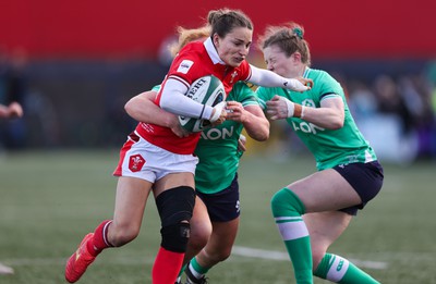 130424 - Ireland  v Wales, Guinness Women’s 6 Nations - Jasmine Joyce of Wales is held short of the line